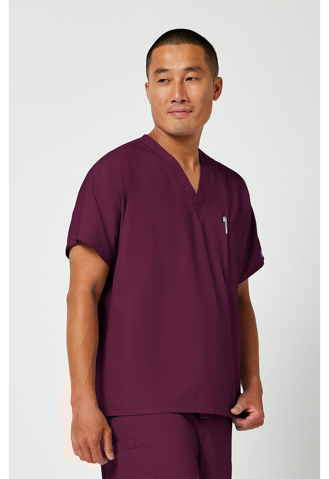 Cherokee Workwear Unisex tuniek met V-hals met vleermuismouwen en borstzak WWE4777