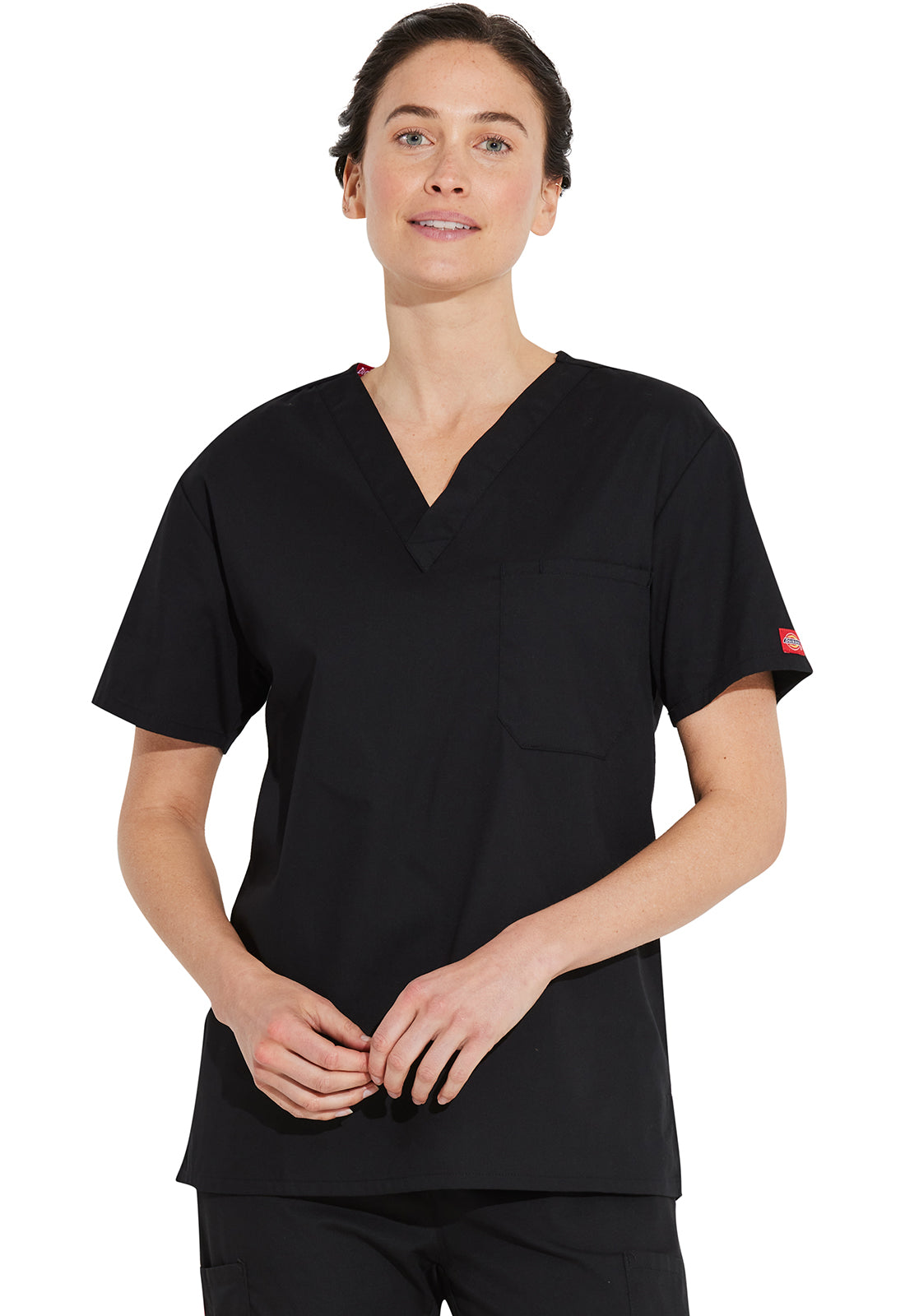 Unisex top met V-hals die in de broek gedragen kan worden met borstzak en zijsplitten