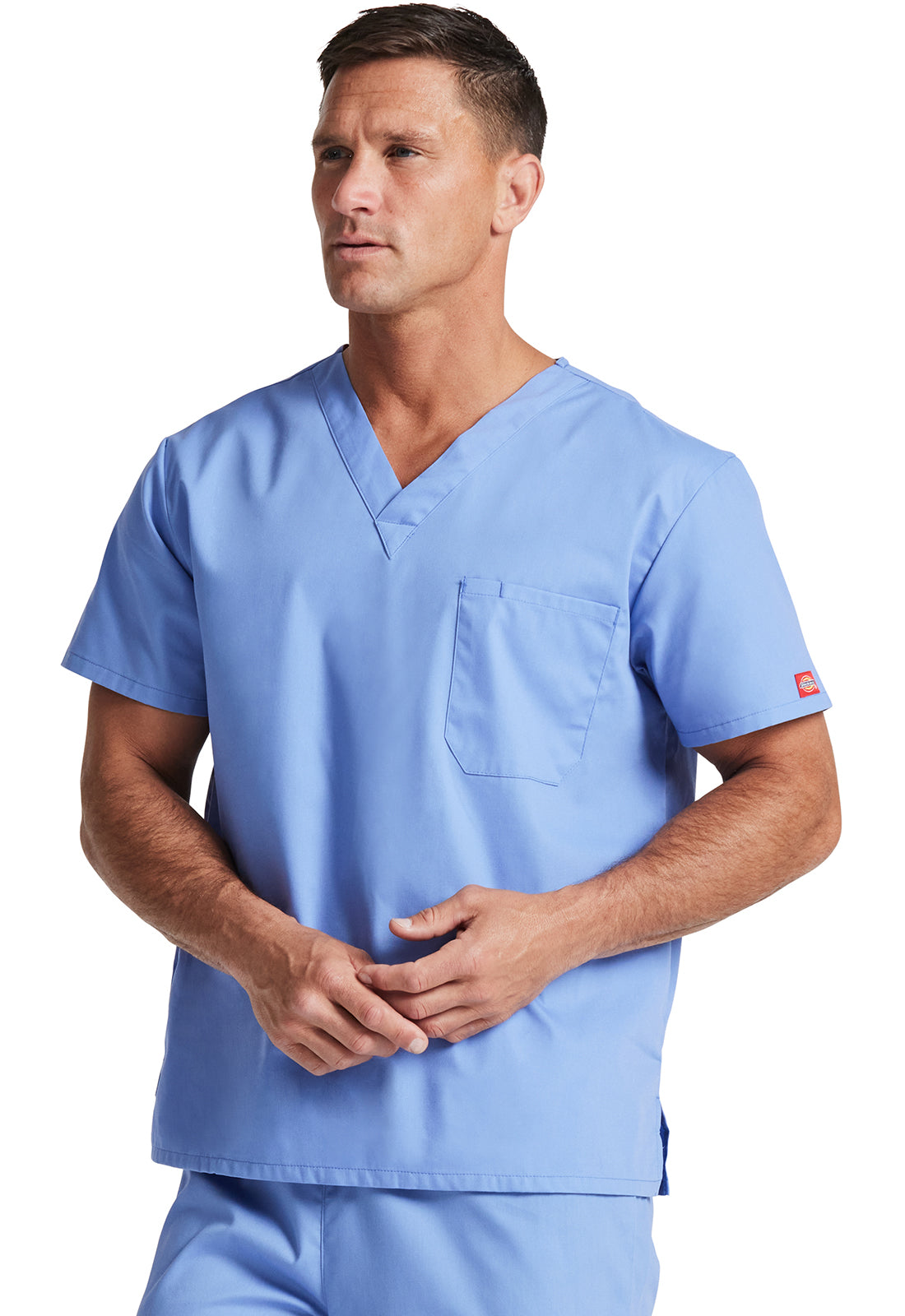 Unisex top met V-hals die in de broek gedragen kan worden met borstzak en zijsplitten