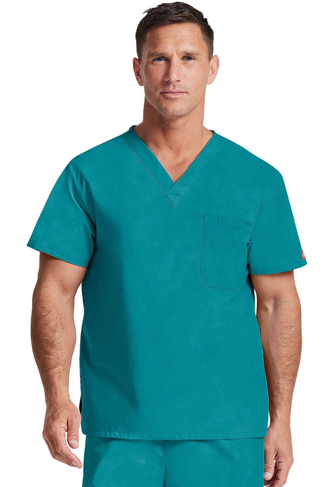 Unisex top met V-hals die in de broek gedragen kan worden met borstzak en zijsplitten