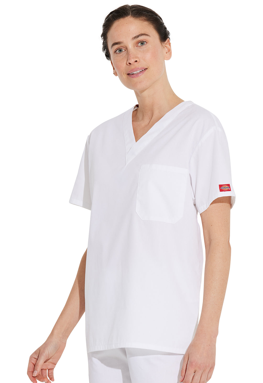 Unisex top met V-hals die in de broek gedragen kan worden met borstzak en zijsplitten