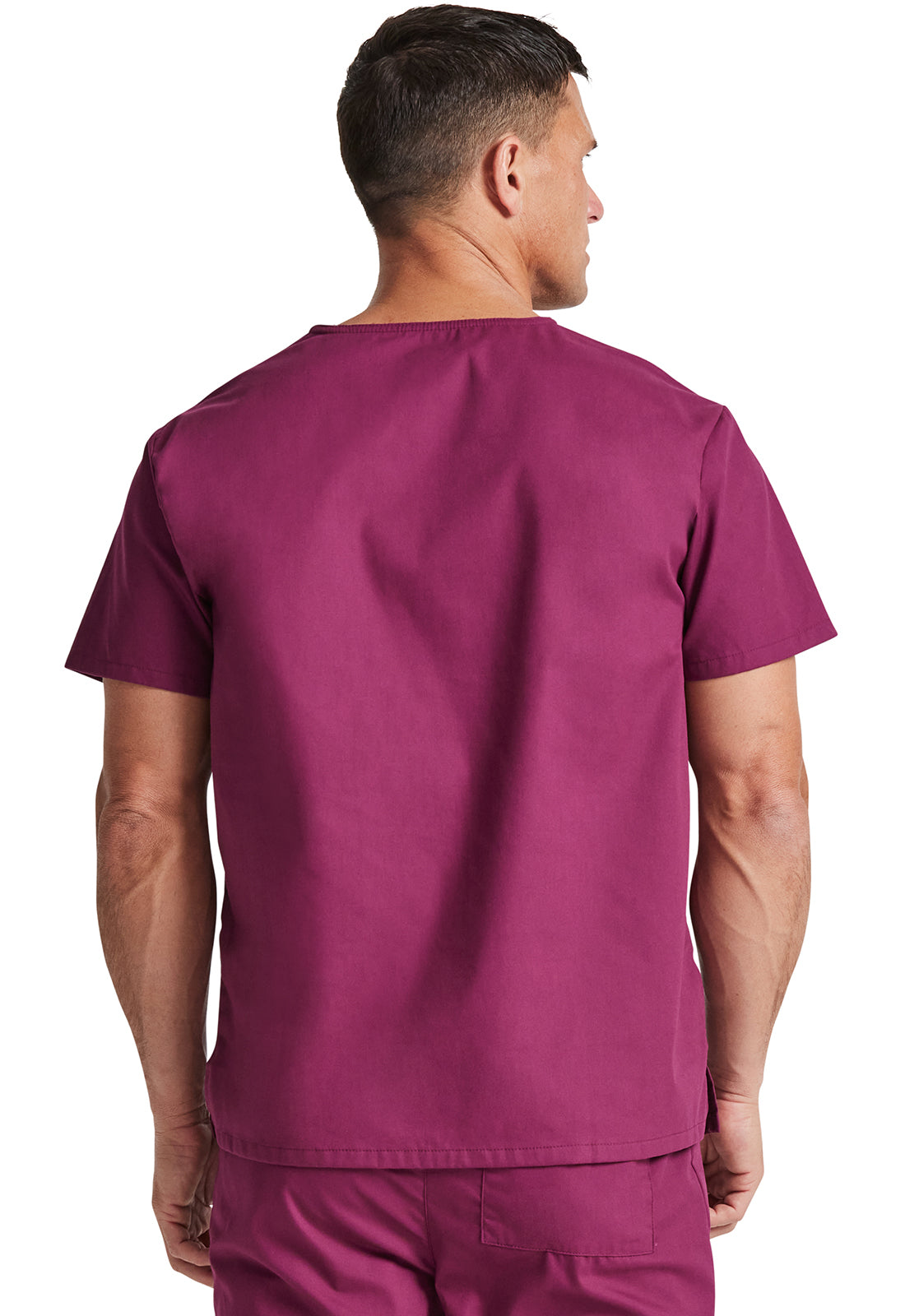 Unisex top met V-hals die in de broek gedragen kan worden met borstzak en zijsplitten