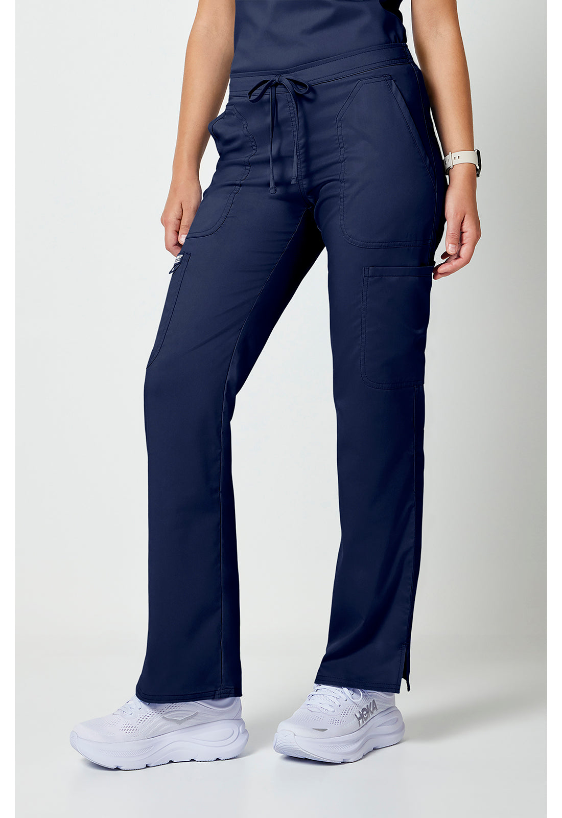 Mid-rise jeans met gematigde uitlopende pijpen en trekkoord met cargozakken en 2-way stretch WWE120