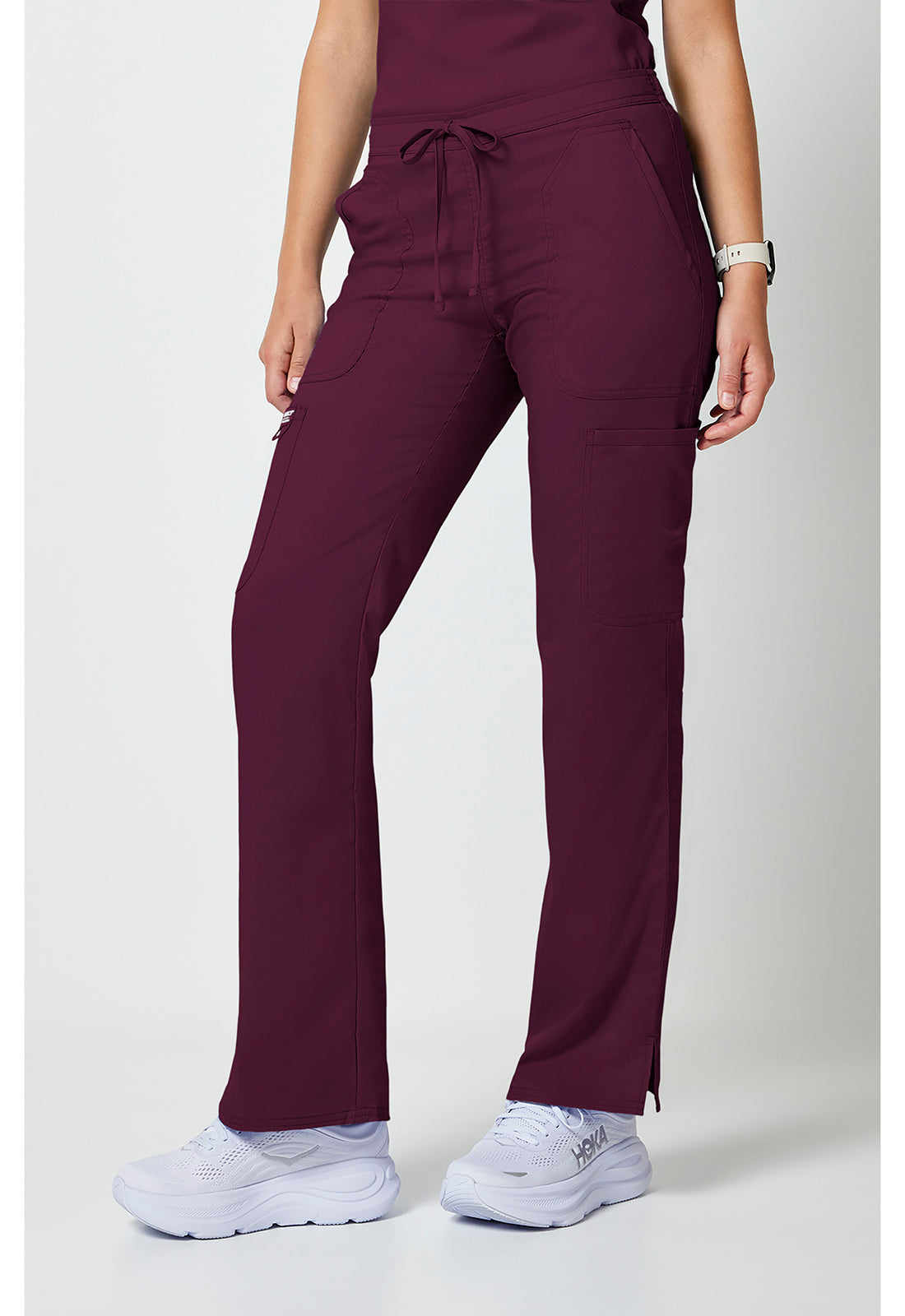 Mid-rise jeans met gematigde uitlopende pijpen en trekkoord met cargozakken en 2-way stretch WWE120