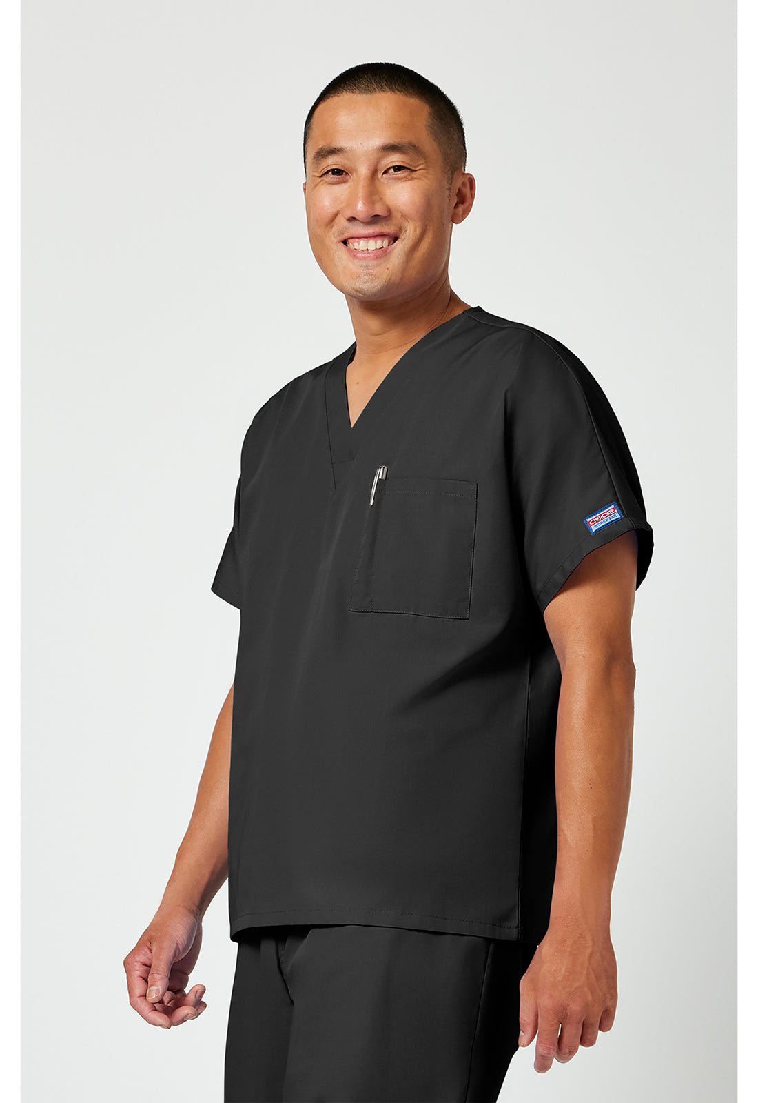 Cherokee Workwear Unisex tuniek met V-hals met vleermuismouwen en borstzak WWE4777