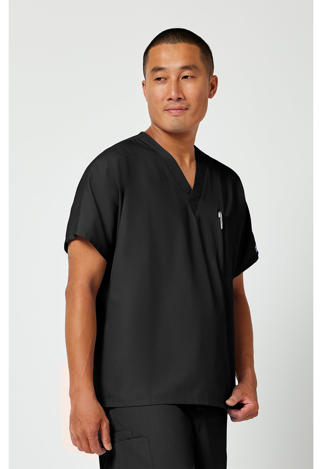 Cherokee Workwear Unisex tuniek met V-hals met vleermuismouwen en borstzak WWE4777