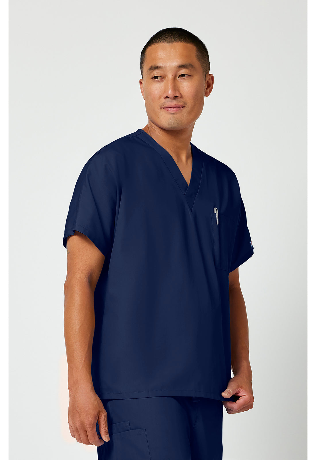 Cherokee Workwear Unisex tuniek met V-hals met vleermuismouwen en borstzak WWE4777