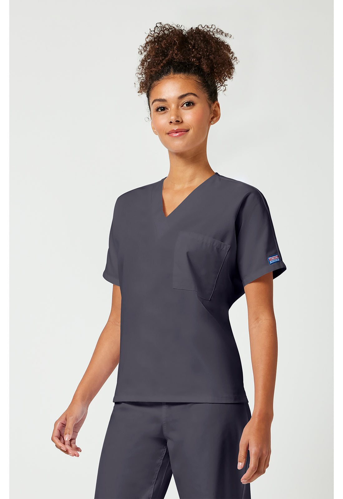 Cherokee Workwear Unisex tuniek met V-hals met vleermuismouwen en borstzak WWE4777