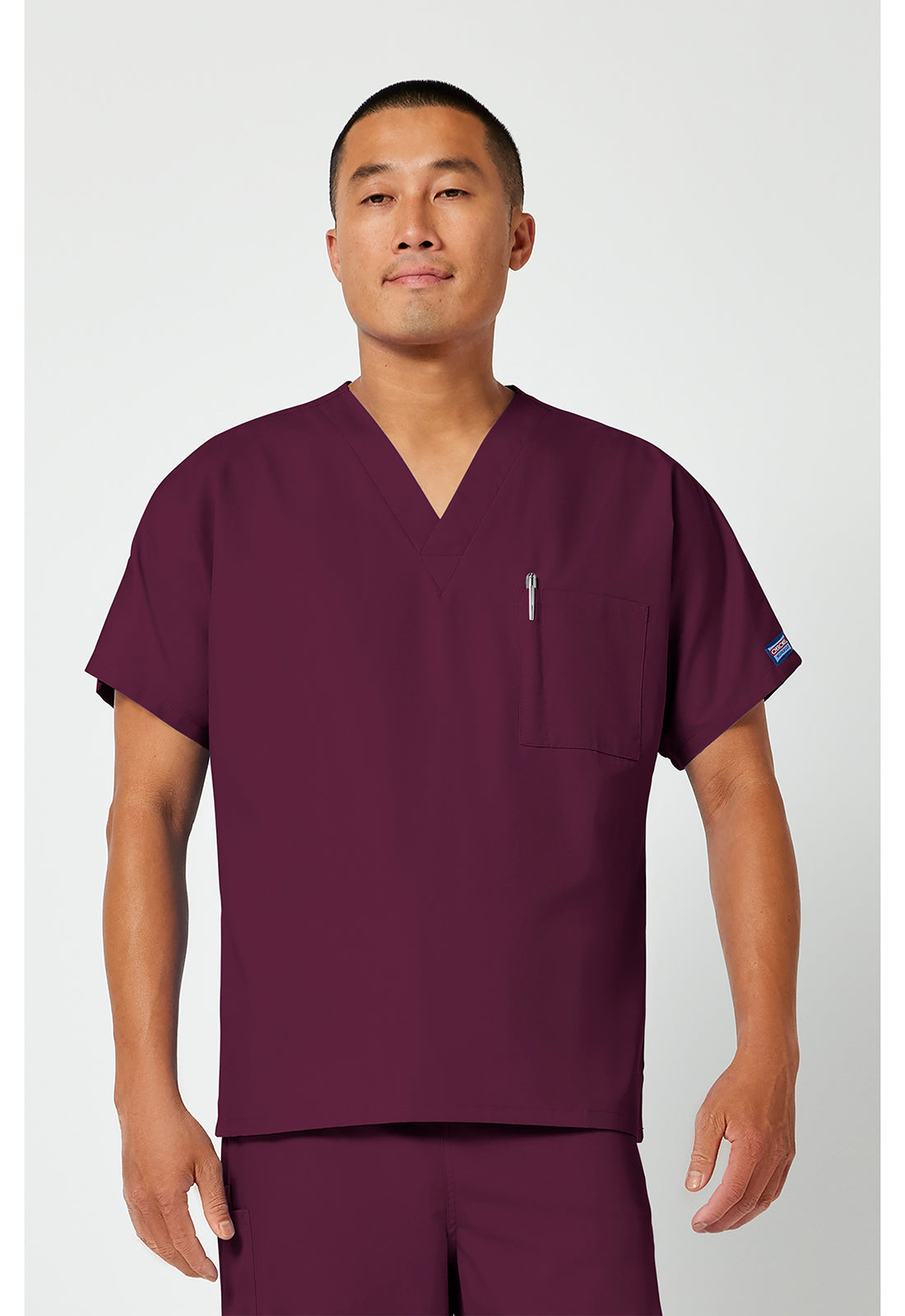 Cherokee Workwear Unisex tuniek met V-hals met vleermuismouwen en borstzak WWE4777