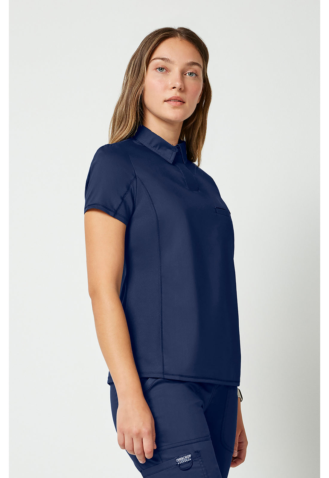 Cherokee Workwear Instopbare polo met drukknoopsluiting aan de voorkant met meshpanelen en 2-way stretch WWE698